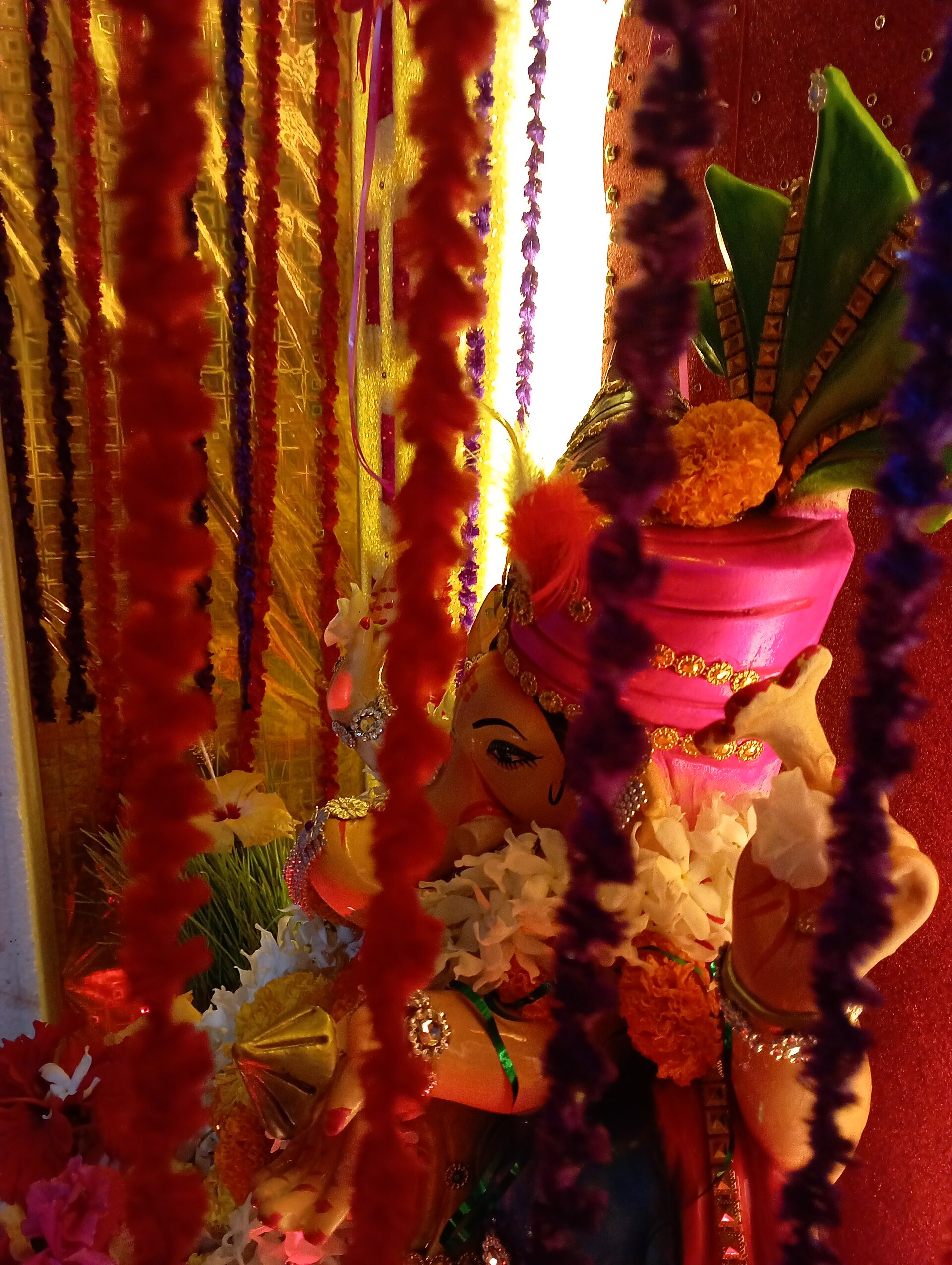 Flowers and lamps offered at a shrine