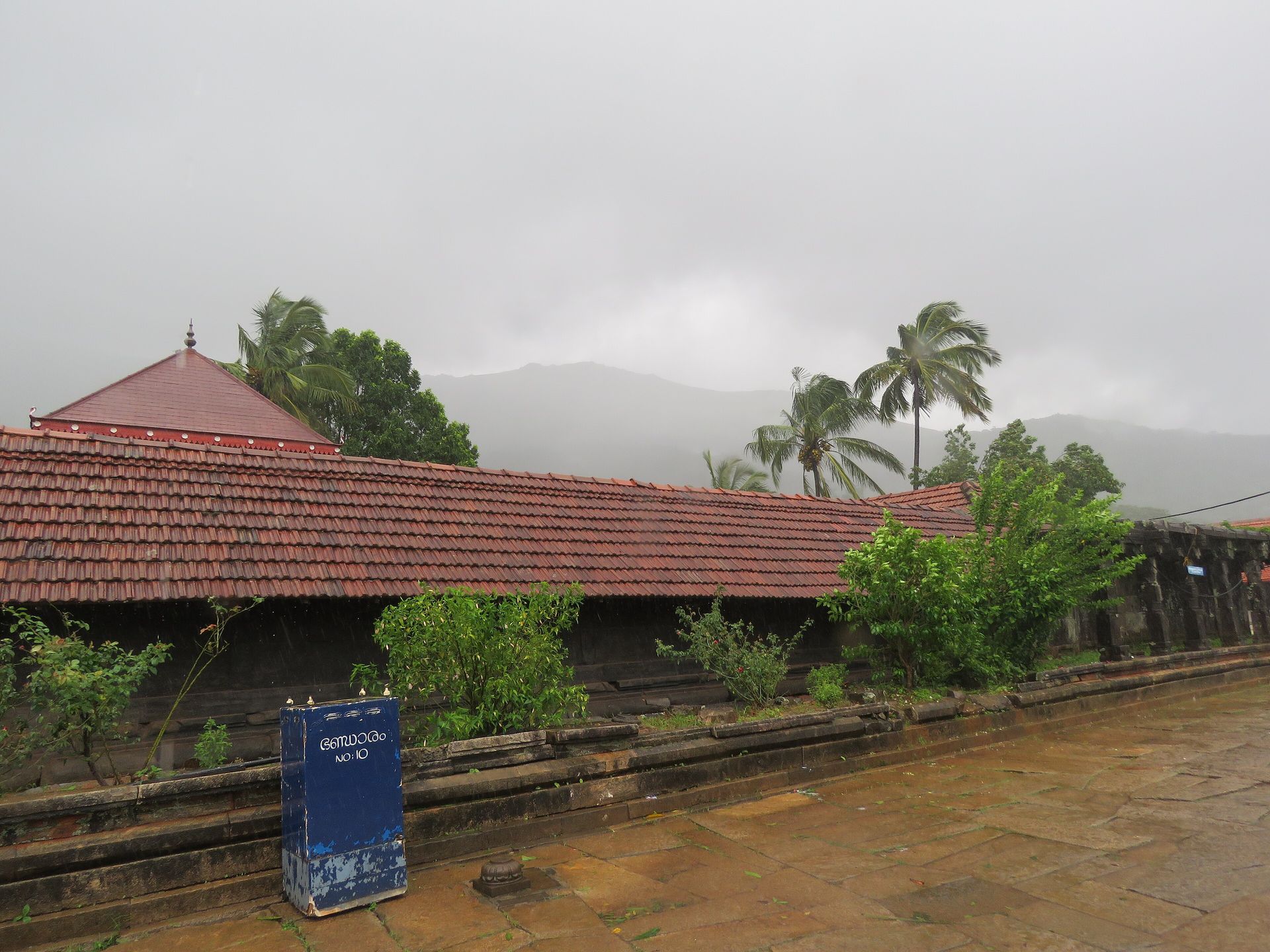 The Thirunelly temple roofs beneath the Brahmagiri hills